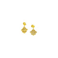 Pair of gold earrings on a white background