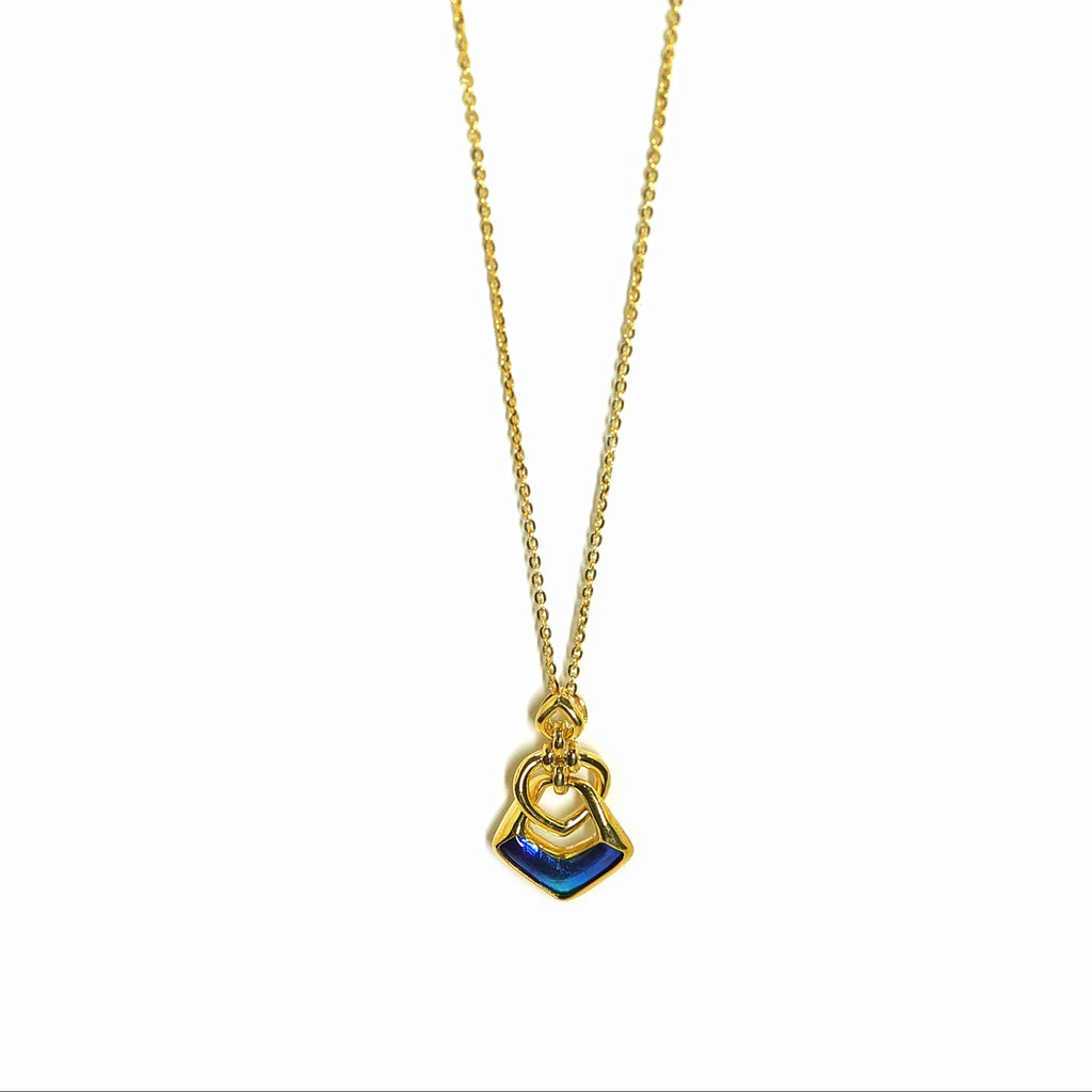 Midnight embrace gold pendant necklace