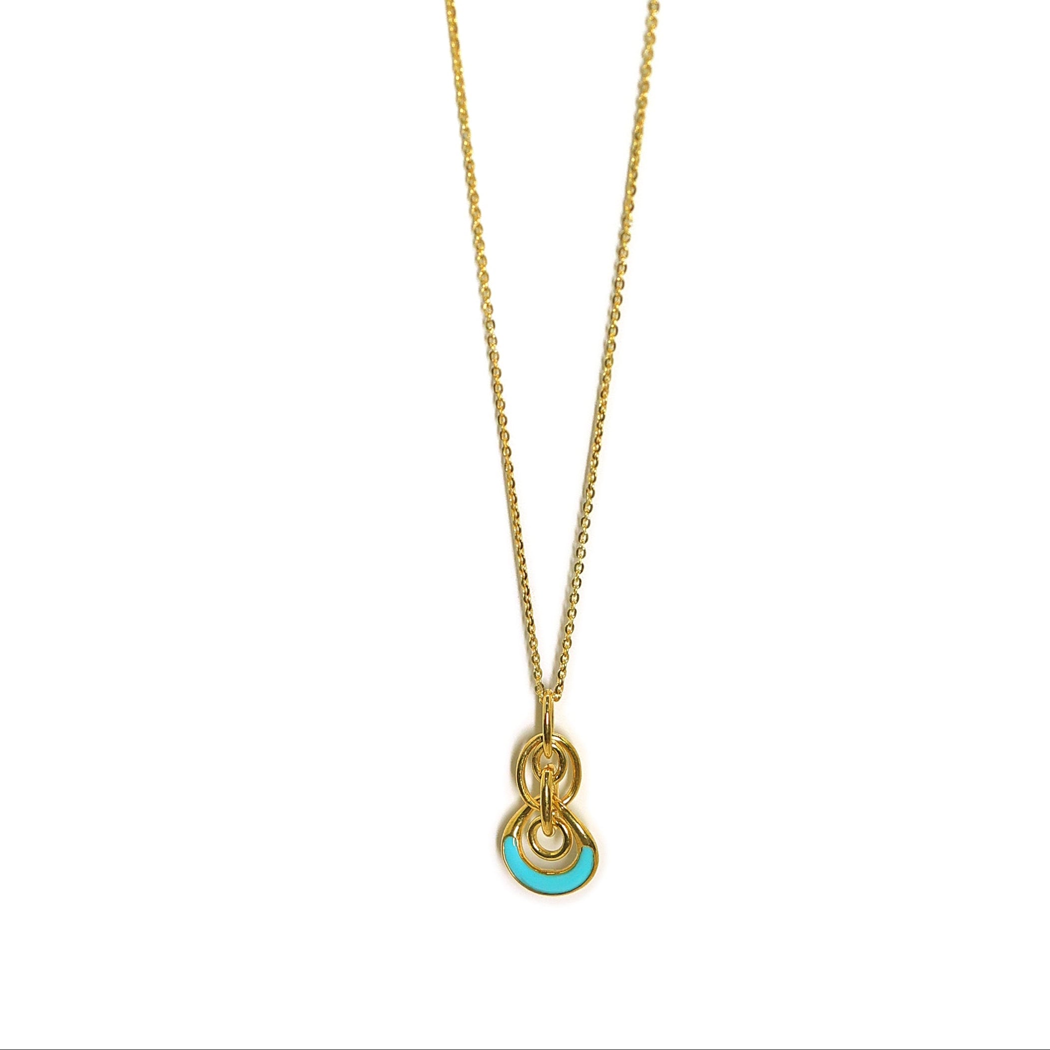 Gold necklace with a pendant on a white background